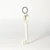 Porte-clés en forme de clé phosphorescente